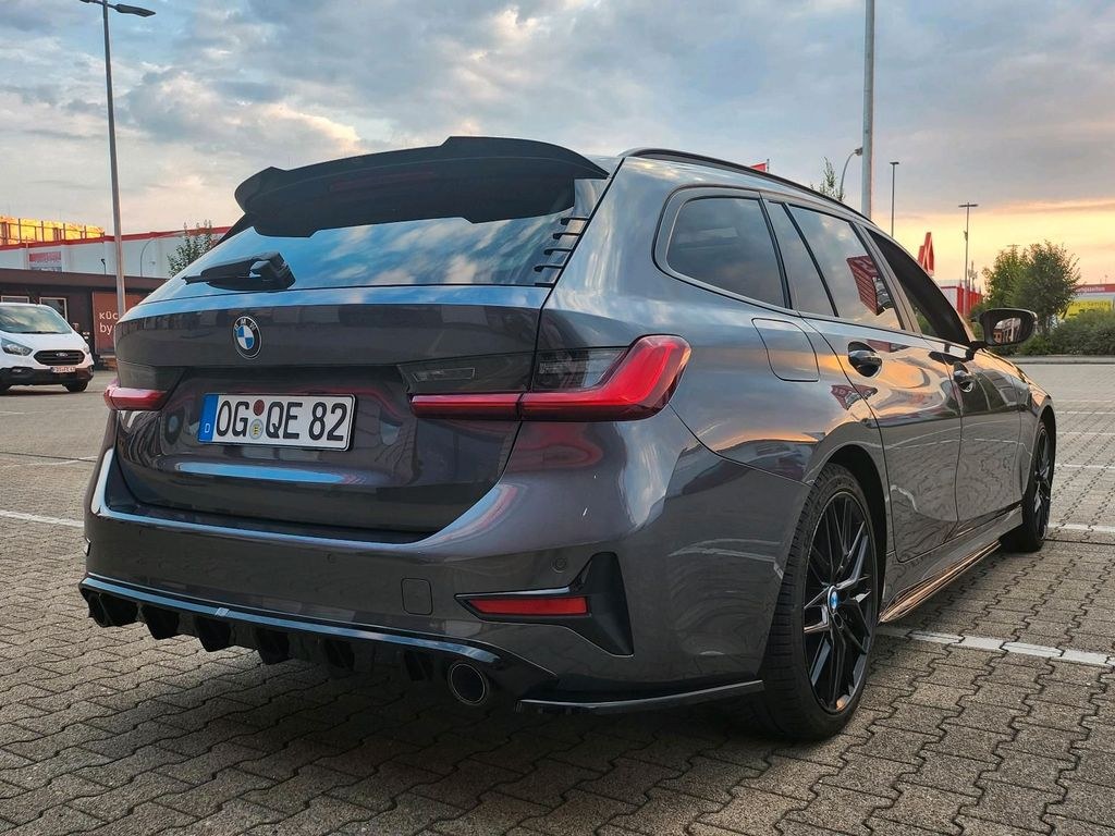 نمای دیگر بی ام و بی ام و 318d تورینگ لاین لوکس لاین اسپرت g21