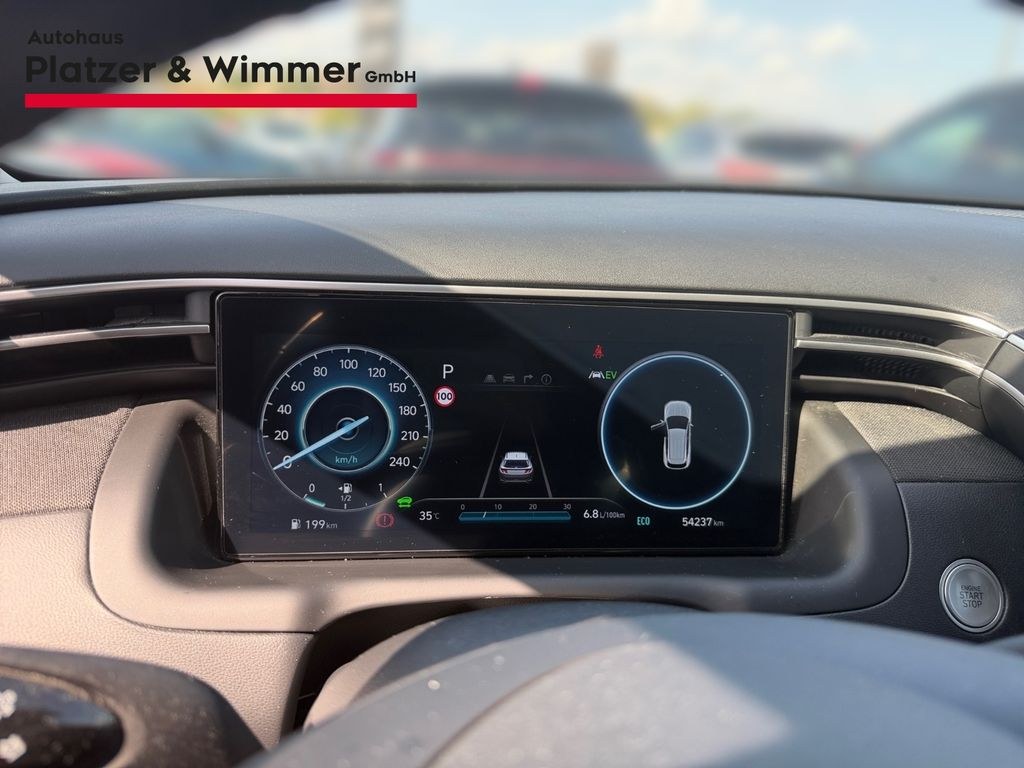 نمای دیگر هیوندای توسان ترند هیبرید 2WD ناوی داشبورد دیجیتال L